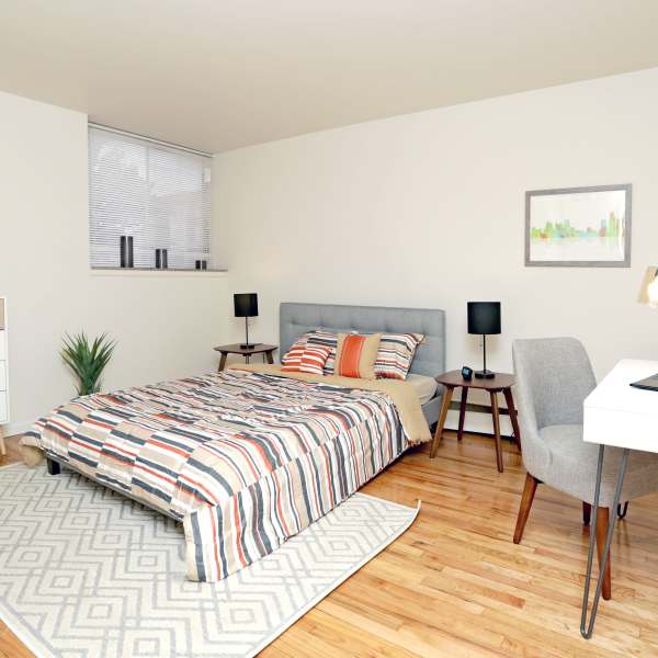 Model bedroom at Detroit Living in Detroit, 