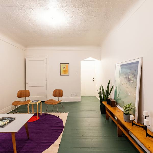 Living room with table and chairs at Detroit Living in Detroit, Michigan