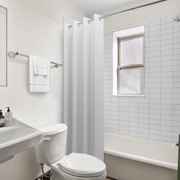 Bathroom with bathtub at Detroit Living in Detroit, Michigan