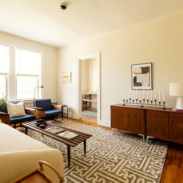 Living room with couch at Detroit Living in Detroit, Michigan