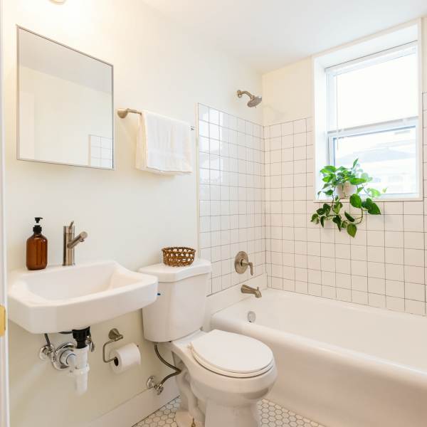 Bathroom with soaking bathtub at Detroit Living in Detroit, Michigan