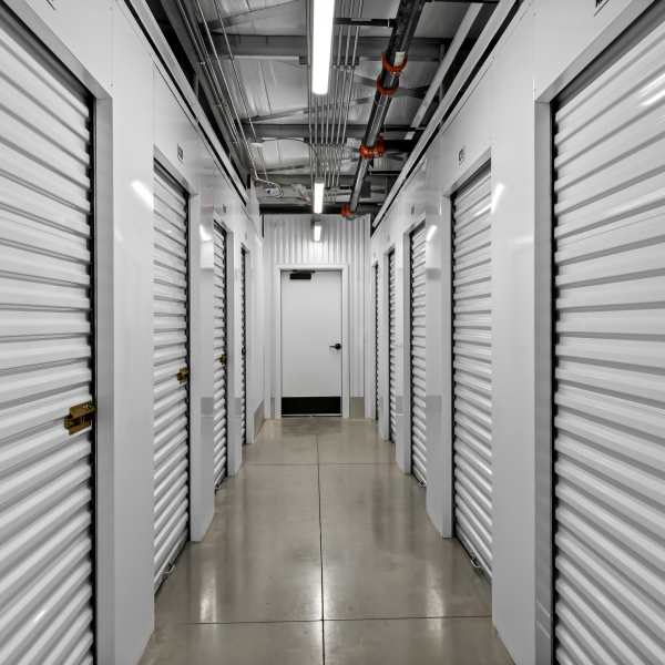Red doors on indoor units at StorQuest Express in Douglasville, Georgia