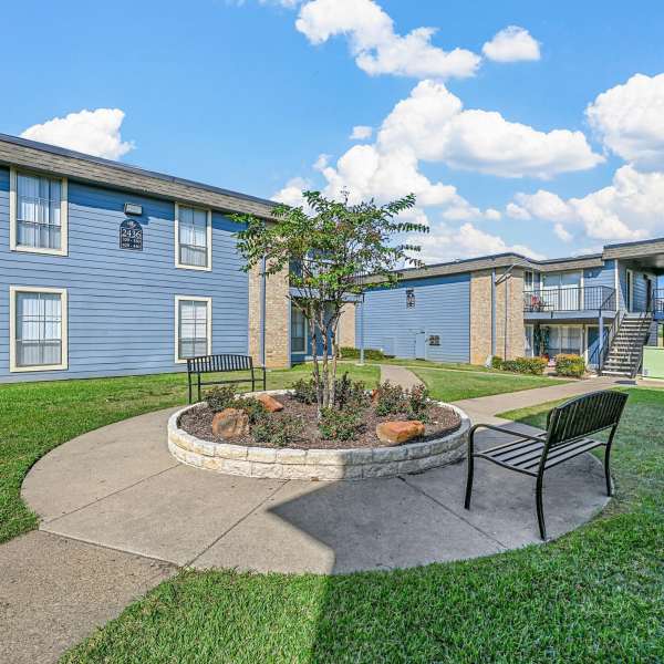 Outdoor community area at Sheng-Raamco Management Inc in Englewood Cliffs,