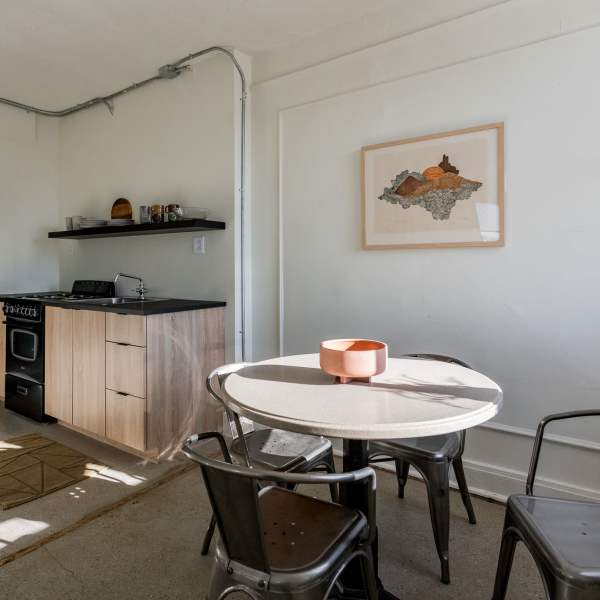 Dining table with chairs at Detroit Living in Detroit, Michigan