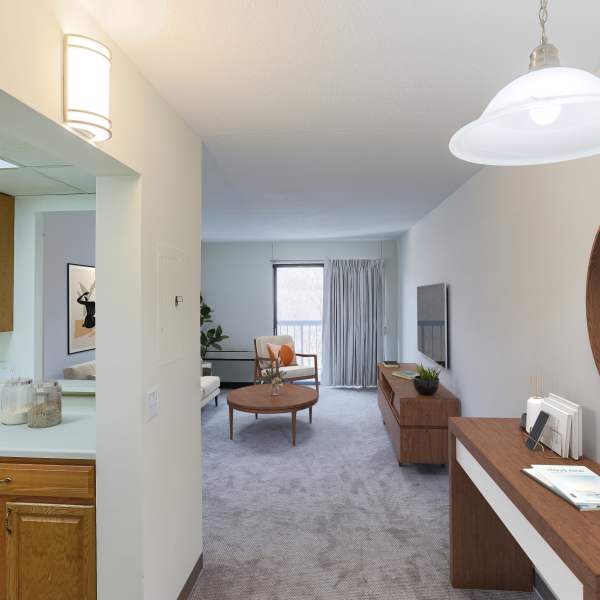 Living room and pass-through to the kitchen of a model apartment at Coraopolis Towers in Coraopolis, Pennsylvania