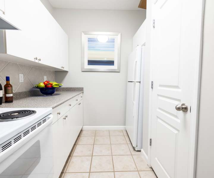 Interior of a modern apartment kitchen at The Grove at Oakbrook in Summerville, South Carolina