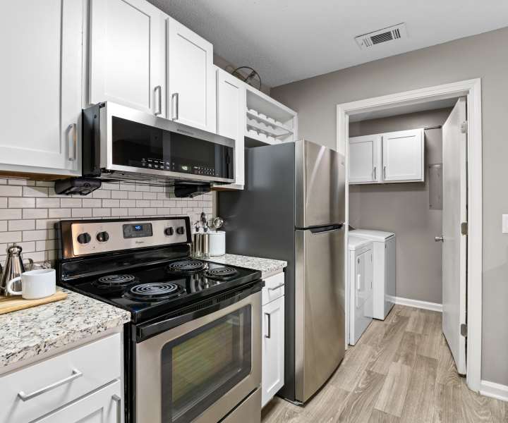 Kitchen in a furnished model apartment at Vetra Asheville in Arden, North Carolina