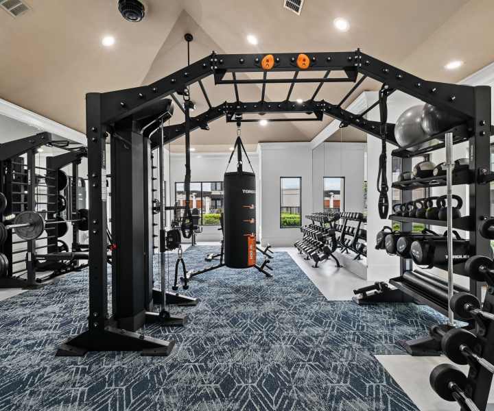 Modern fitness center with strength equipment at Benton in Dallas, Texas 