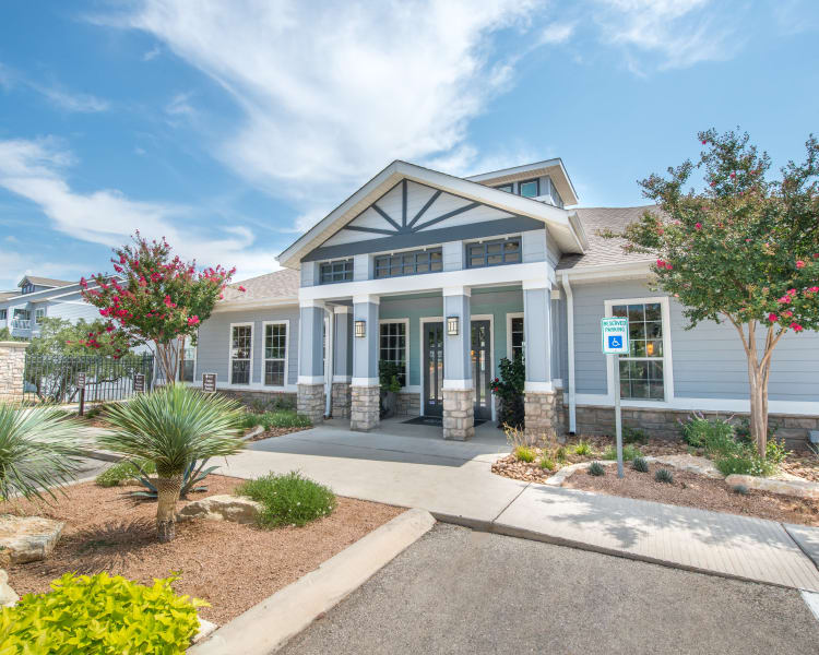 Parking area and leasing office at Archer Stone Canyon in San Antonio, Texas