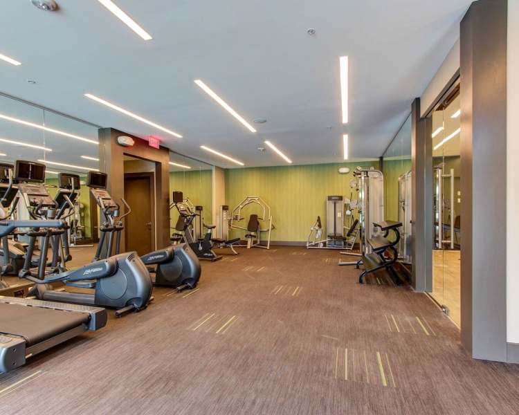Fitness center with exercise bikes at The Elms at Arcola in Dulles, Virginia