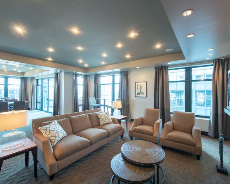 Comfy couches and chairs in the lounge at The Eden in Baltimore, Maryland