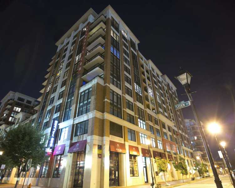 Nighttime view of apartment building at The Eden in Baltimore, Maryland