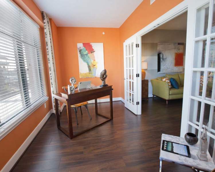 Sun room with large windows at The Eden in Baltimore, Maryland