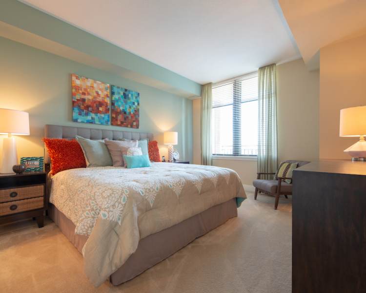 Bedroom with plush carpeting at The Eden in Baltimore, Maryland