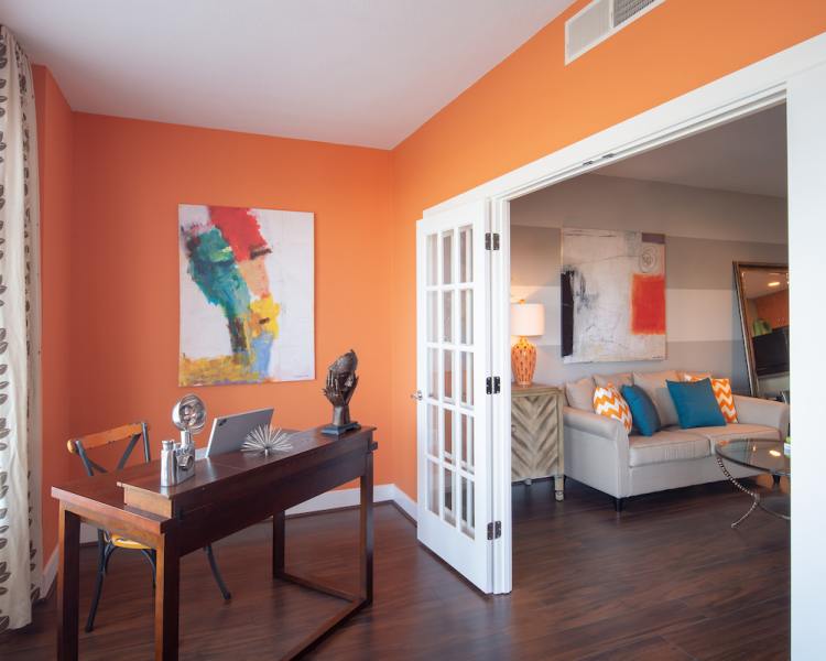 Living space with a sun room at The Eden in Baltimore, Maryland