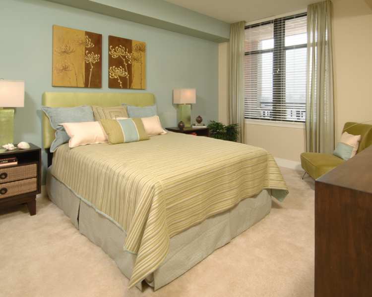 Bedroom with a bed and nightstands at The Eden in Baltimore, Maryland