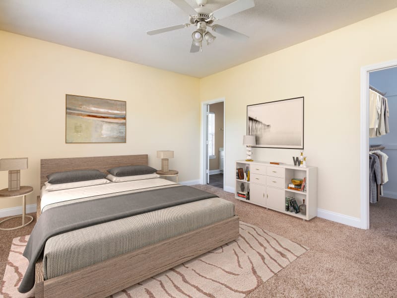 A furnished model bedroom at Adrian On Riverside in Macon, Georgia