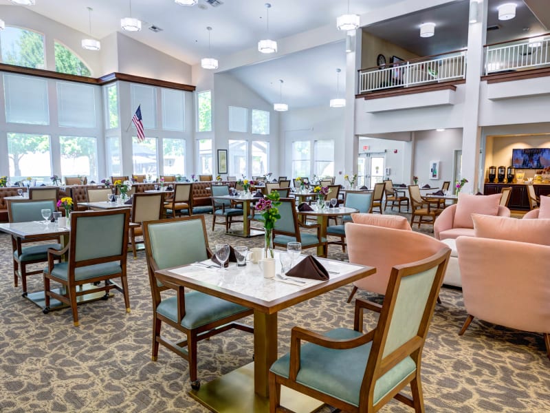 Dining room with cathedral ceilings at Vineyard Heights Assisted Living in McMinnville, Oregon
