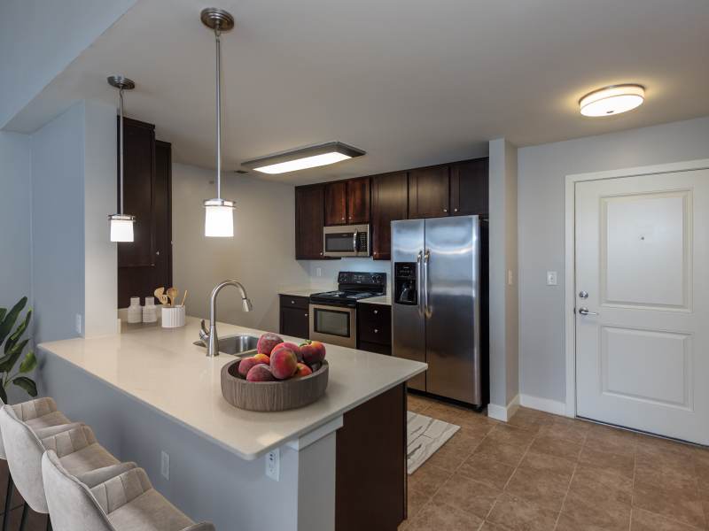 Living room with view of bedroom at Solace Apartments in Virginia Beach, Virginia