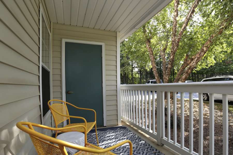 Apartment patio outside at Acasă Willowbrook Apartments in Simpsonville, South Carolina