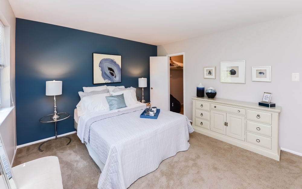 Model bedroom with walk-in closet at Brookside Manor Apartments & Townhomes in Lansdale, Pennsylvania