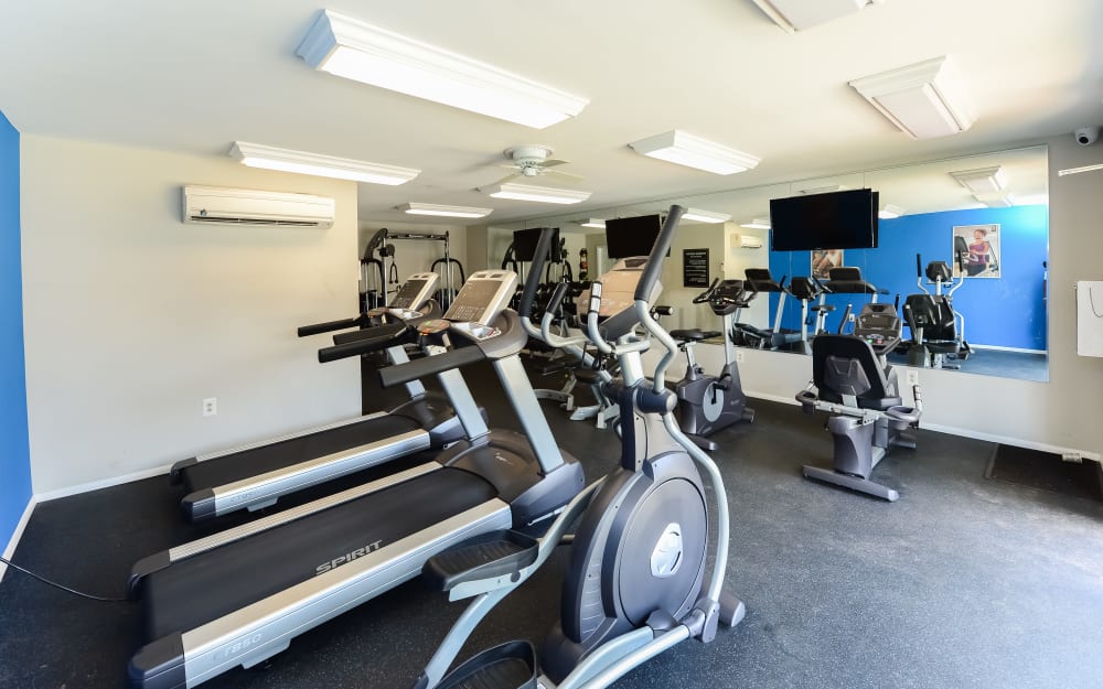Well-equipped fitness center with cardio equipment at Brookside Manor Apartments & Townhomes in Lansdale, Pennsylvania