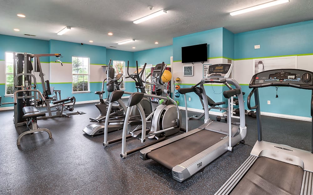 Well-equipped fitness center with cardio equipment at Main Street Apartments in Huntsville, Alabama