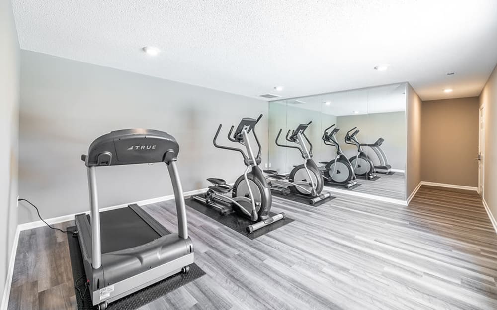 Well-equipped fitness center with cardio equipment at Sharon Pointe Apartment Homes in Charlotte, North Carolina