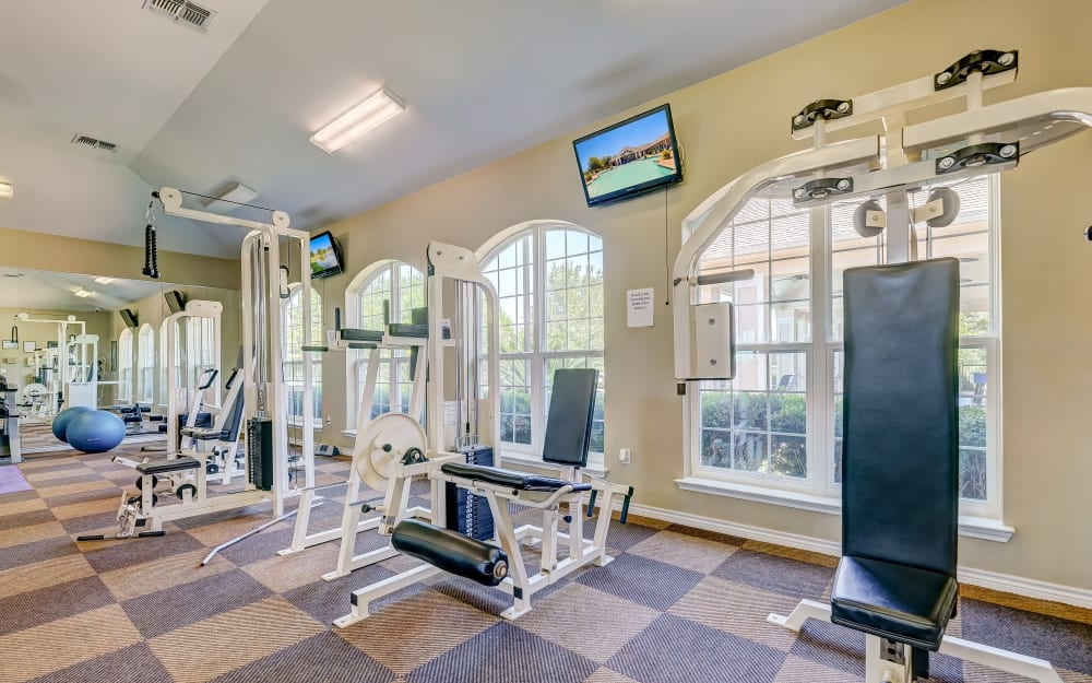 Well-equipped fitness center with cardio equipment at River Walk Apartment Homes in Shreveport, Louisiana