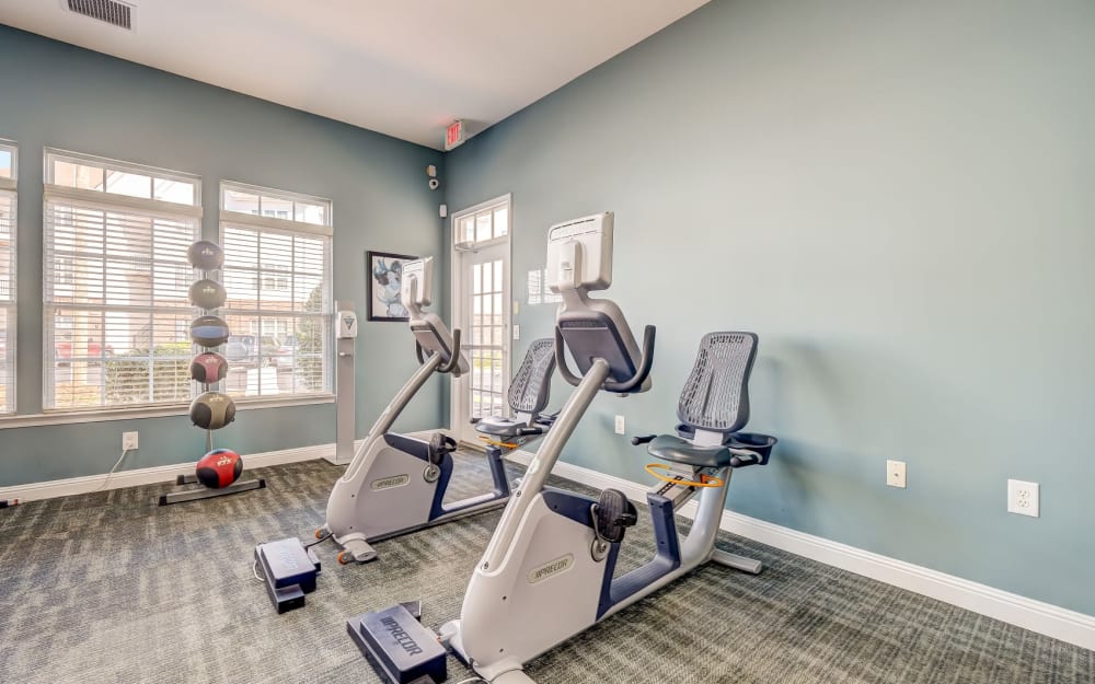 Well-equipped fitness center with cardio equipment at Carden Place Apartment Homes in Mebane, North Carolina