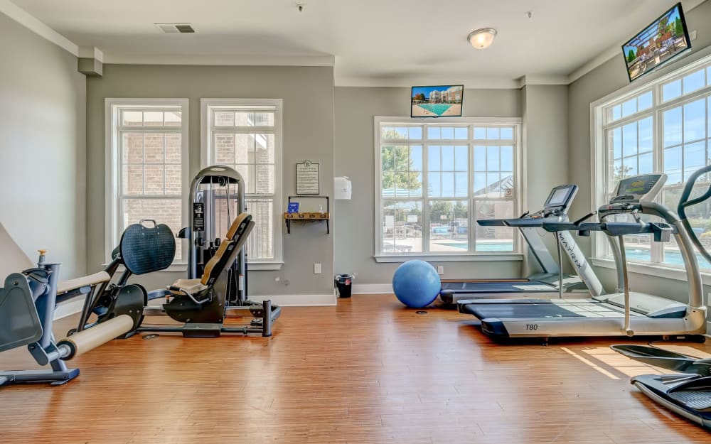 Well-equipped fitness center with cardio equipment at Reserve at Kenton Place Apartment Homes in Cornelius, North Carolina