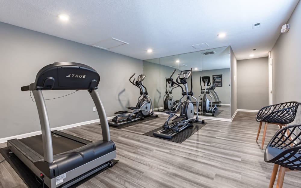 Well-equipped fitness center with cardio equipment at Parkway Station Apartment Homes in Concord, North Carolina