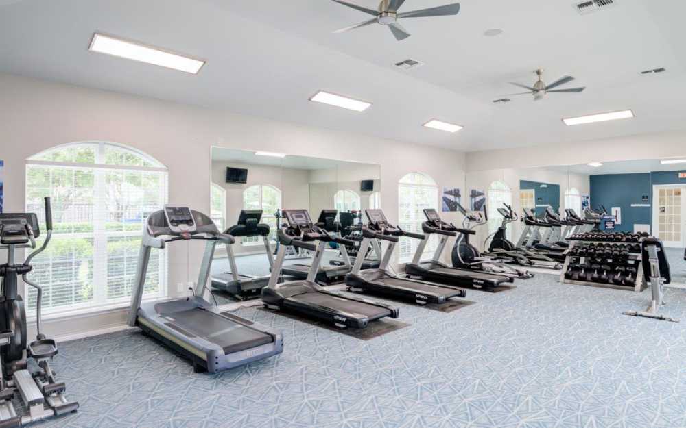 Well-equipped fitness center with cardio equipment at River Walk Apartment Homes in Shreveport, Louisiana