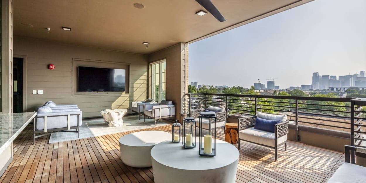 Rooftop patio area overlooking the city at Ross + Peak in Dallas, Texas