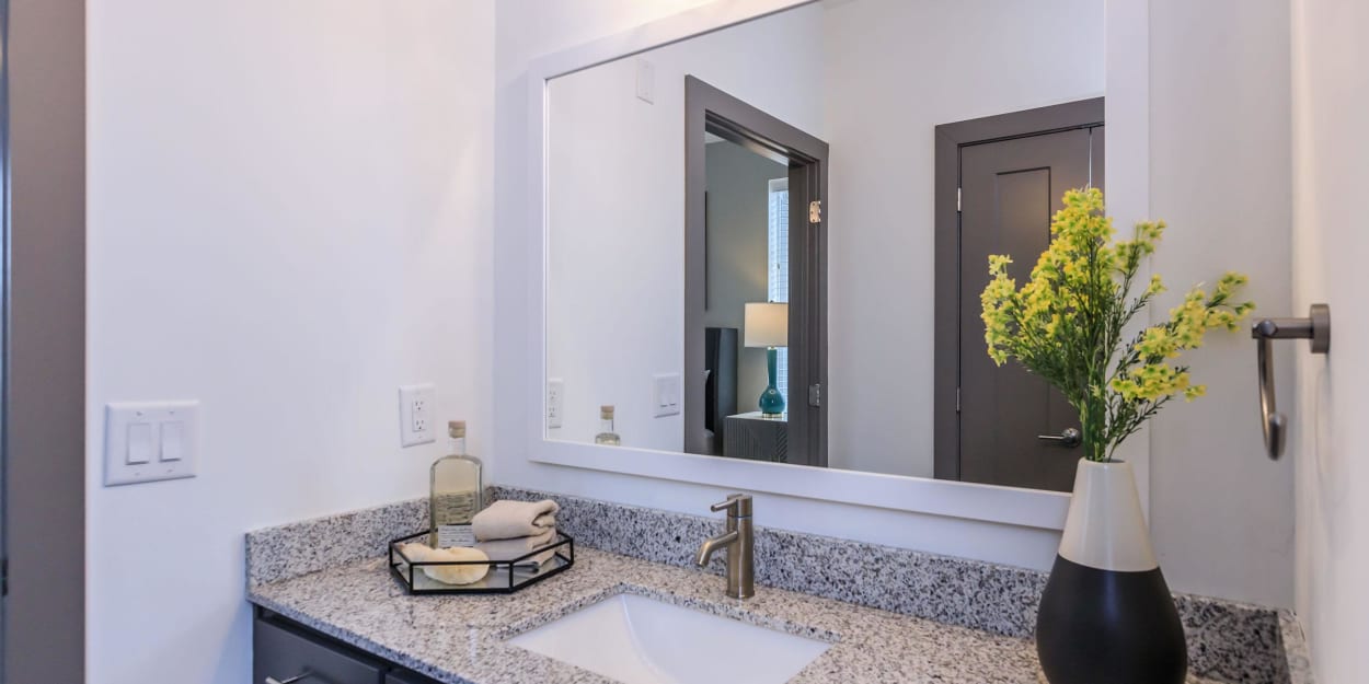 Modern finishes in an apartment bathroom at Mandolin at Stream Valley in Franklin, Tennessee