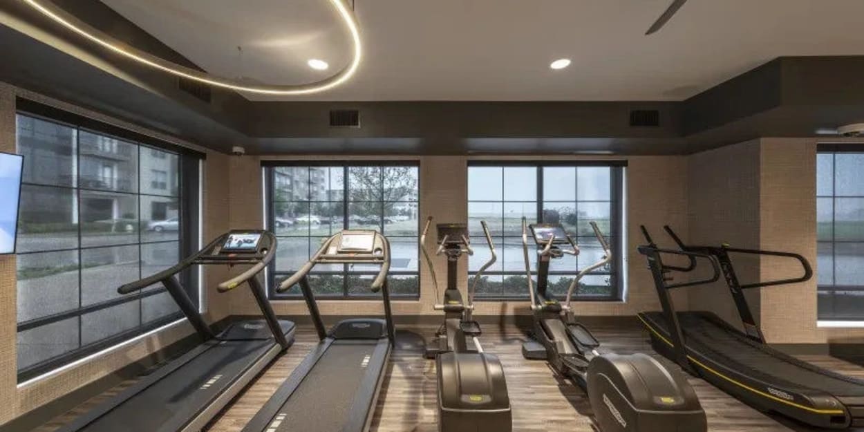 Cardio equipment in the fitness center at The Register in Richardson, Texas