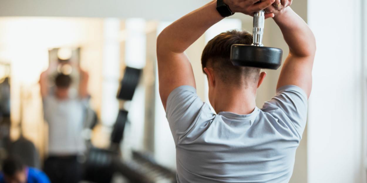 Resident in the fitness center at The Meadowlark at Fairview in Fairview, Oregon