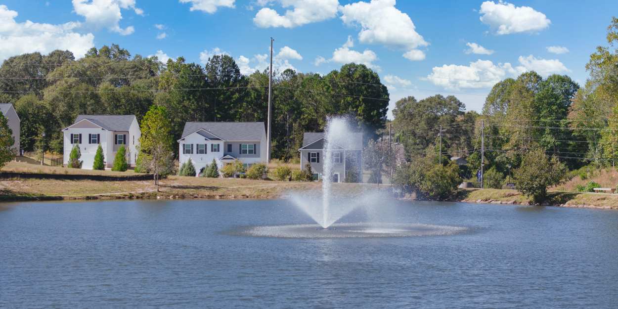 Fountain in the pond at The Lakes at Statham in Statham, Georgia