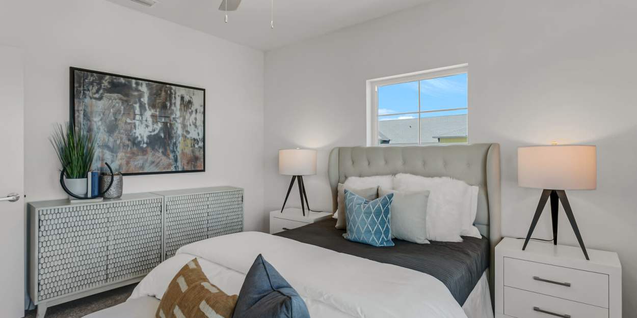 Cozy bedroom at Grand Oak Apartments in Largo, Florida