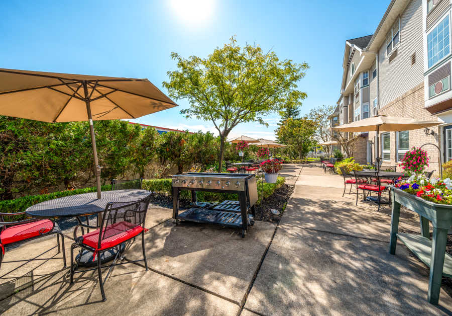 Outdoor grill area at Waltonwood Royal Oak in Royal Oak, MI