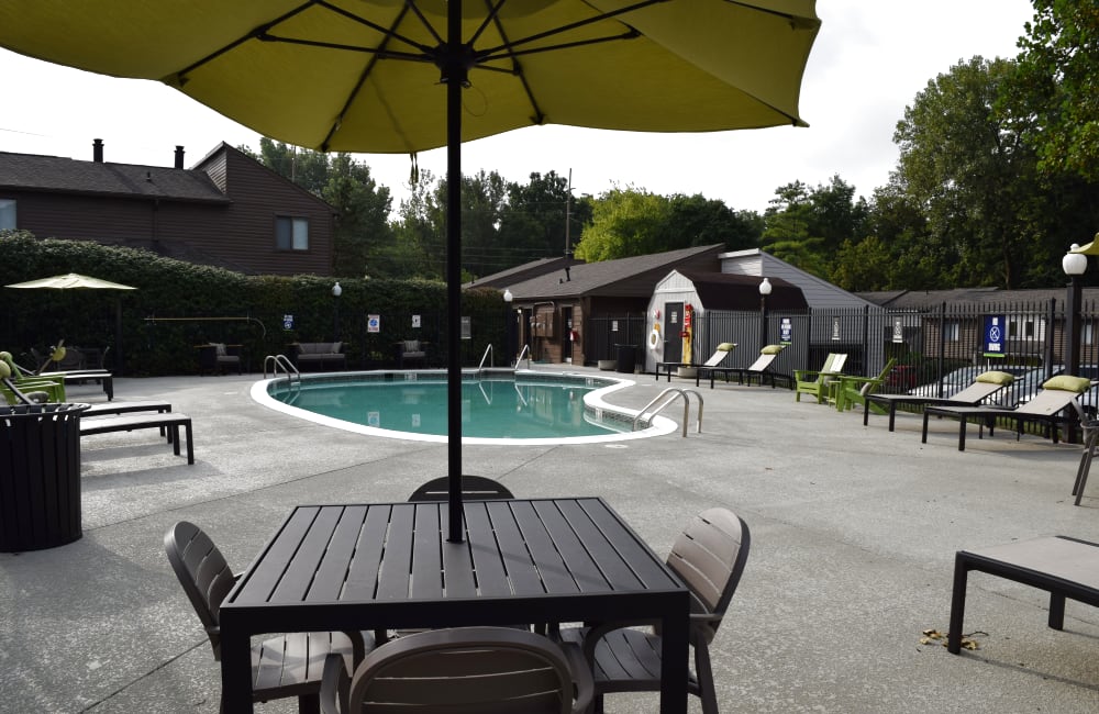 Swimming pool and sundeck lounge seating at The Preserve on Allisonville in Indianapolis, Indiana