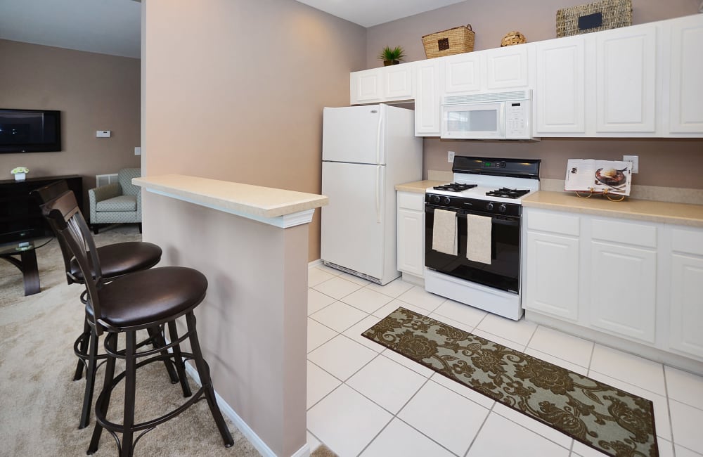 A kitchen in an apartment at Woodview at Marlton Apartment Homes in Marlton, New Jersey