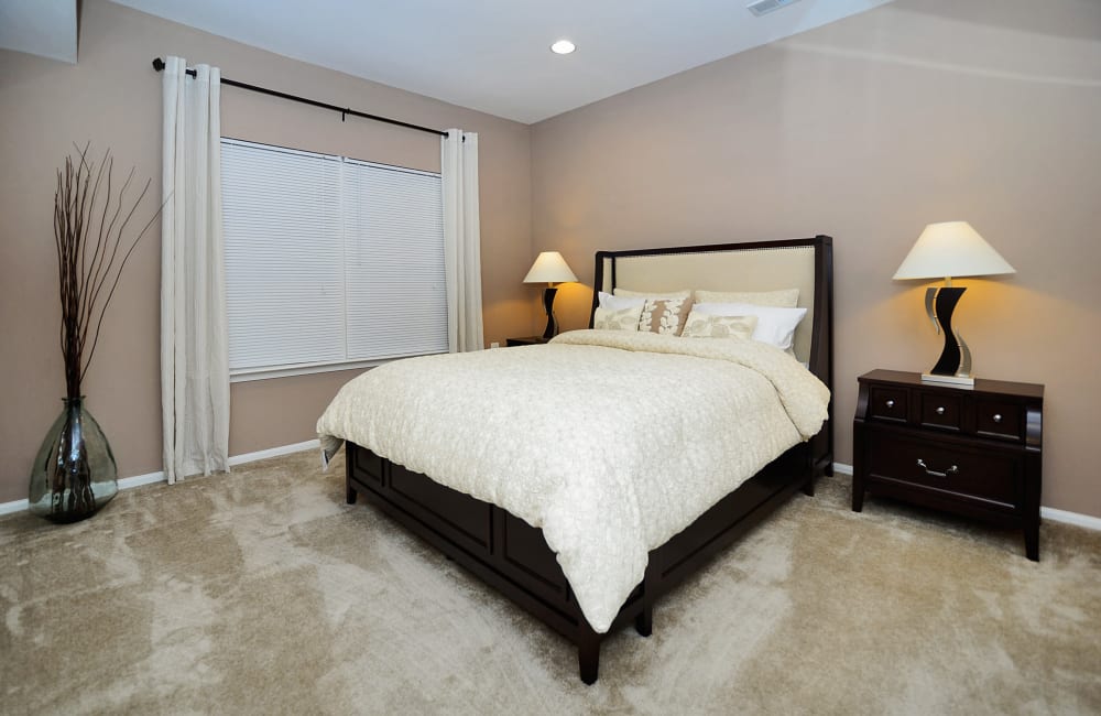 A bedroom in an apartment at Woodview at Marlton Apartment Homes in Marlton, New Jersey