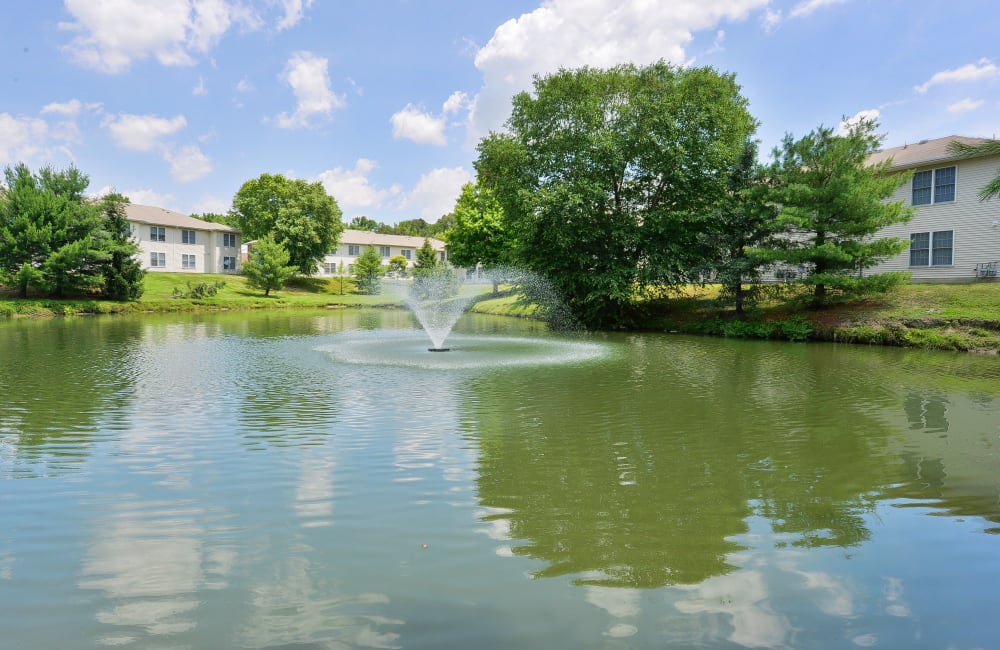 Lake with a fountain at Woodview at Marlton Apartment Homes in Marlton, New Jersey