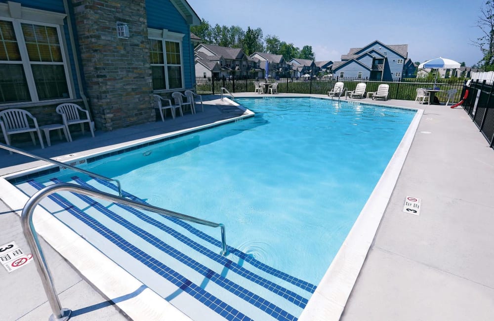 Sparkling swimming pool and sundeck at North Ponds Apartments & Townhomes in Webster, New York