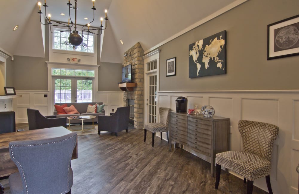 Hangout inside the clubhouse by the pool at The Woods at Polaris Parkway Apartments & Townhomes in Westerville, Ohio