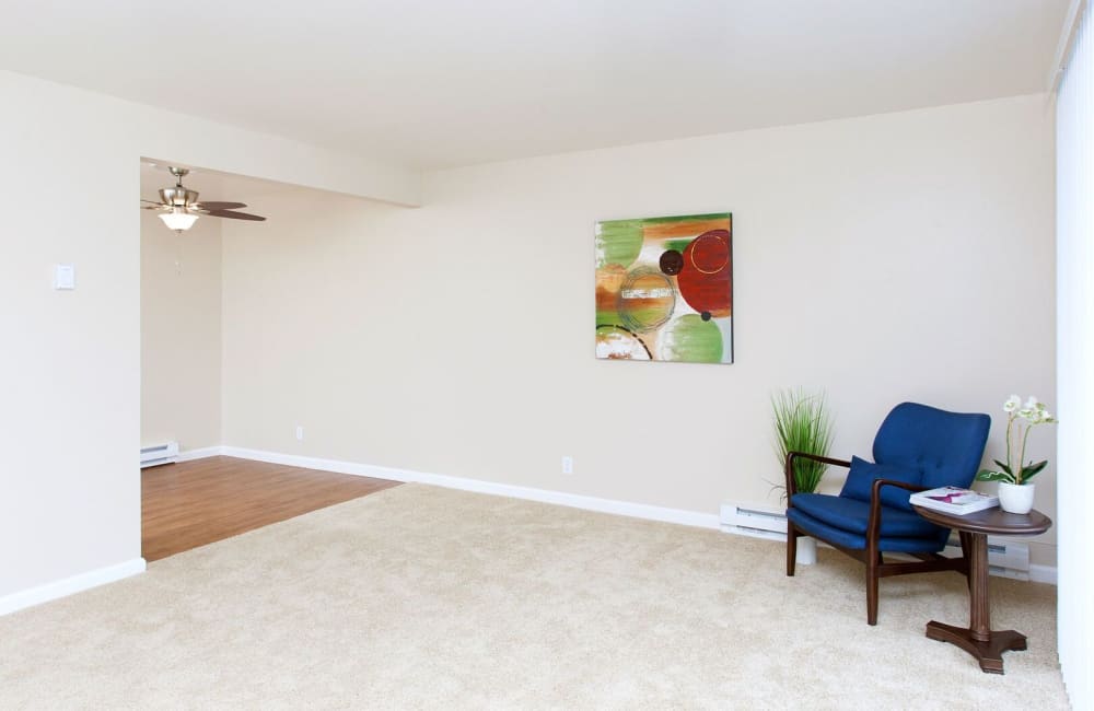 carpeted living space at Brewster Place in Redwood City, California