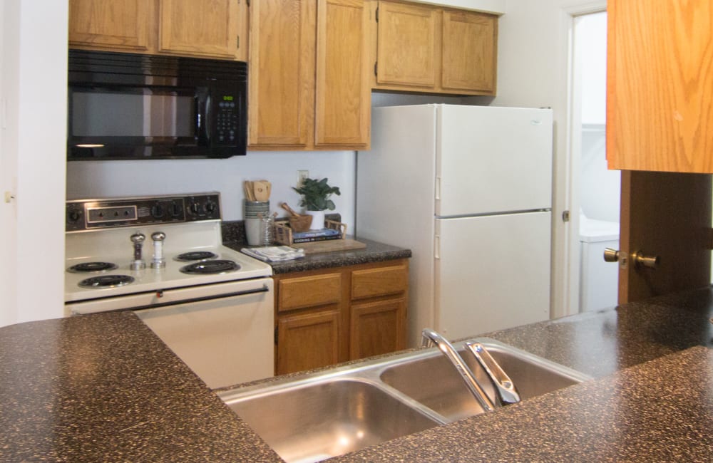 Kitchen in a home at Hidden Lakes Apartment Homes in Miamisburg, Ohio