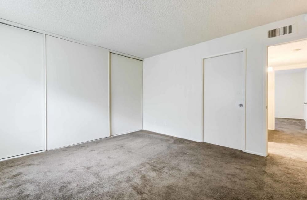 Bedroom with hallway at Sienna Heights Apartments apartment homes in Lancaster, California