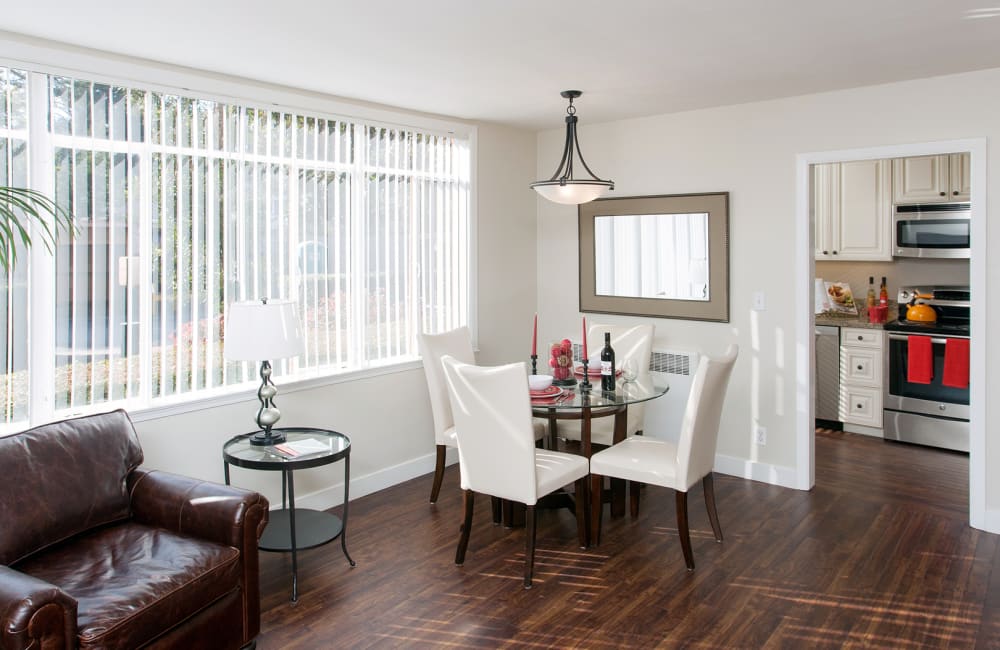 a well lit dining area at Park Royal Apartments in San Mateo, California